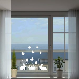 Osterhasen, Schmetterline und Ostereier aus weißem Vinyl. Selbstklebende Aufkleber, geeignet als Fensterbilder oder Sticker